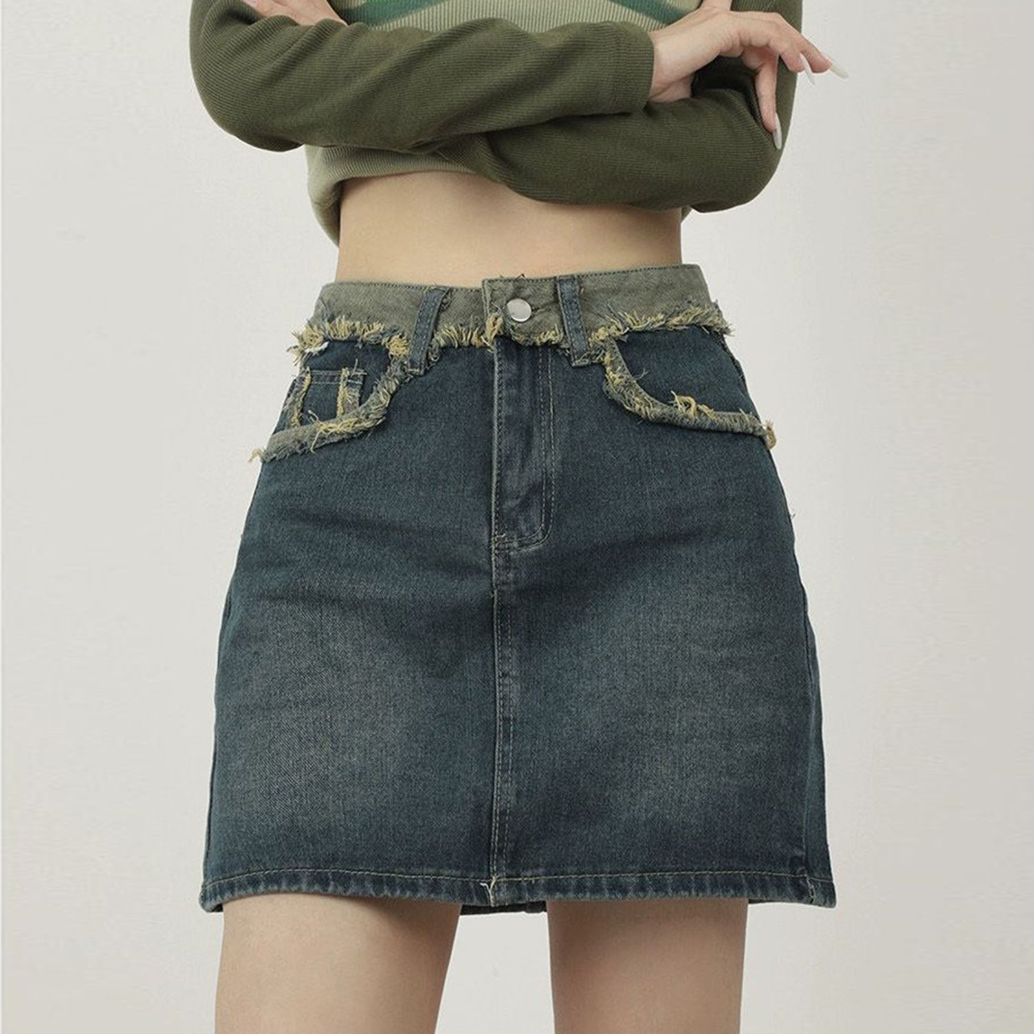 The Raw-Hem Distressed Denim Mini